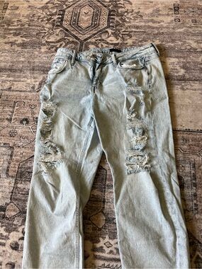 Women’s  Light Blue Distressed Jeans